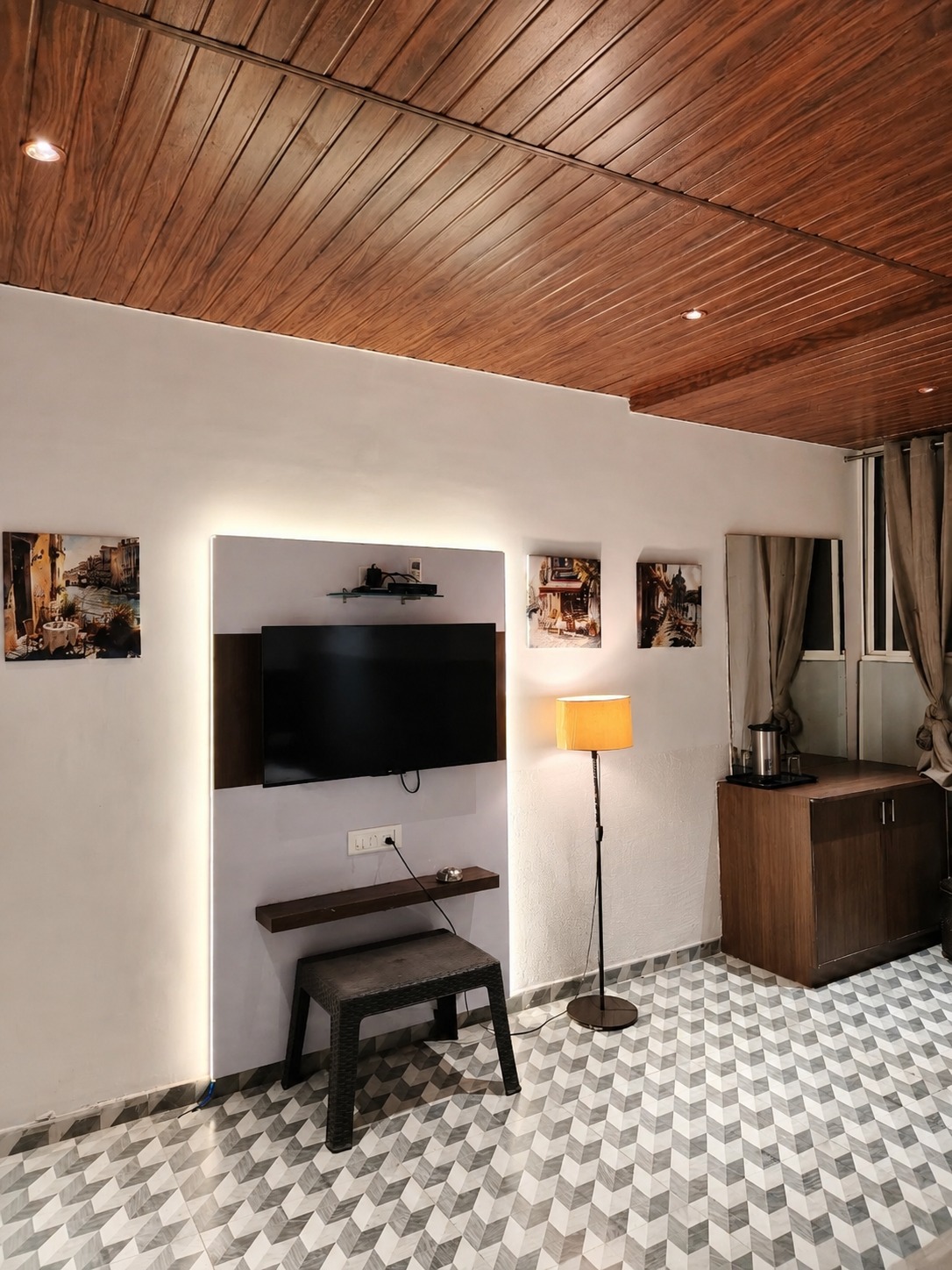 Guest room television wall and dressing area